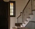 While the remainder of the home features hardwood flooring, all of which was replaced, the entryway welcomes guests with unglazed terracotta tile flooring While the remainder of the home features hardwood flooring, all of which was replaced, the entryway welcomes guests with unglazed terracotta tile flooring