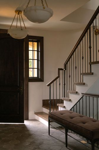 While the remainder of the home features hardwood flooring, all of which was replaced, the entryway welcomes guests with unglazed terracotta tile flooring While the remainder of the home features hardwood flooring, all of which was replaced, the entryway welcomes guests with unglazed terracotta tile flooring