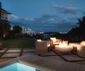 The inspiration for this project was to maximize available space—both inside the home and within the backyard. Because this home is situated on a small lot, an excavator had to be craned in over the fence from the street below. The intimate poolside lounge area features Lumacast’s OVA slim fire feature and a sensational view of downtown Seattle The inspiration for this project was to maximize available space—both inside the home and within the backyard. Because this home is situated on a small lot, an excavator had to be craned in over the fence from the street below. The intimate poolside lounge area features Lumacast’s OVA slim fire feature and a sensational view of downtown Seattle