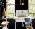 While strolling through Rejuvenation after coffee, Anne spotted the vintage marble sink that adorns the guest bath.The De Wolfs ferried the milled paneling from their property to and from Portland and stained it with General Finishes’ “Lamp Black”. While strolling through Rejuvenation after coffee, Anne spotted the vintage marble sink that adorns the guest bath.The De Wolfs ferried the milled paneling from their property to and from Portland and stained it with General Finishes’ “Lamp Black”.