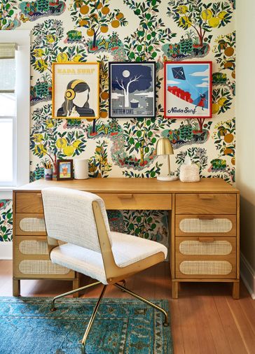 Jeff’s collection of Nada Surf band posters pops against the Schumacher “Citrus Garden” wallcovering. A Rue Cambon chair cozies up to a handsome Alegra desk. Jeff’s collection of Nada Surf band posters pops against the Schumacher “Citrus Garden” wallcovering. A Rue Cambon chair cozies up to a handsome Alegra desk.