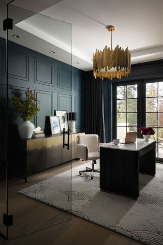 A Four Hands console from J Garner Home and Arhaus desk is set against the custom wall treatment and crowned with an Uttermost Golden Gate Wide Drum chandelier. A Four Hands console from J Garner Home and Arhaus desk is set against the custom wall treatment and crowned with an Uttermost Golden Gate Wide Drum chandelier.