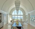 Schultz Miller’s down-to-the-studs restoration of the dramatic barrel-vaulted ceiling’s construction included replacing multiple pieces of rib-like trim with a trio of elegant ones that highlight its curve. Penthouse Drapery’s stationary side panels frame the stunning windows. Schultz Miller’s down-to-the-studs restoration of the dramatic barrel-vaulted ceiling’s construction included replacing multiple pieces of rib-like trim with a trio of elegant ones that highlight its curve. Penthouse Drapery’s stationary side panels frame the stunning windows.