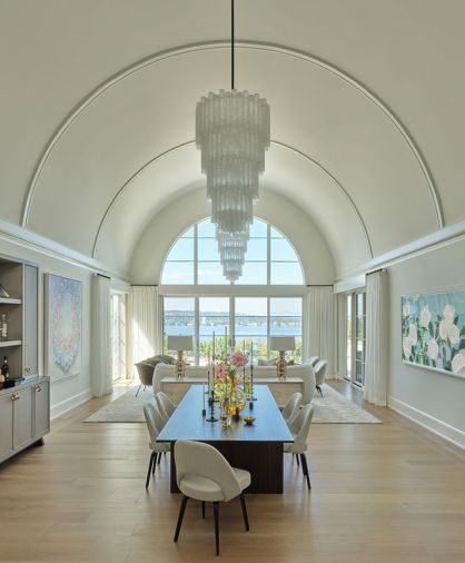 Schultz Miller’s down-to-the-studs restoration of the dramatic barrel-vaulted ceiling’s construction included replacing multiple pieces of rib-like trim with a trio of elegant ones that highlight its curve. Penthouse Drapery’s stationary side panels frame the stunning windows. Schultz Miller’s down-to-the-studs restoration of the dramatic barrel-vaulted ceiling’s construction included replacing multiple pieces of rib-like trim with a trio of elegant ones that highlight its curve. Penthouse Drapery’s stationary side panels frame the stunning windows.