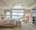 The primary suite beckons with the promise of a comfy king bed and lounge chair easily pulled up before the rebuilt fireplace and surround. The primary suite beckons with the promise of a comfy king bed and lounge chair easily pulled up before the rebuilt fireplace and surround.